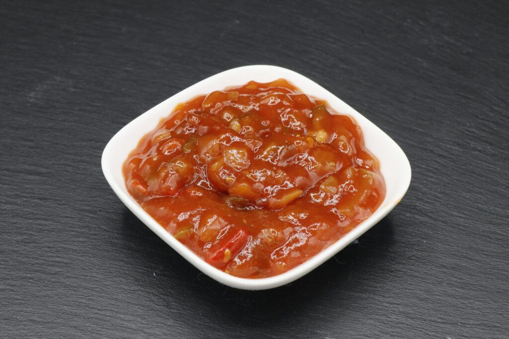Paprikasauce vom Imbiss Fritz in Bielefeld: Würzige und aromatische Sauce, perfekt als Begleitung zu Currywurst, Schnitzel und mehr – ein Genuss für jeden Geschmack.
