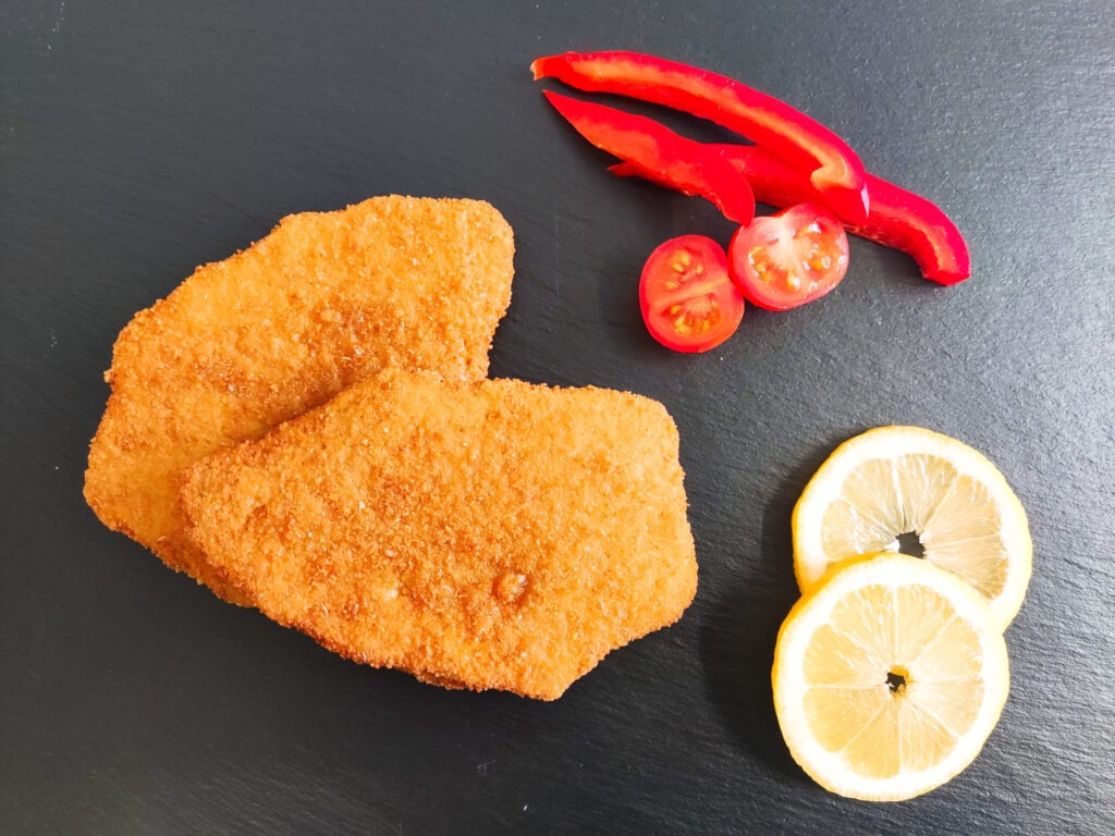 No Schnitzel vom Imbiss Fritz in Bielefeld: Pflanzliches Schnitzel, knusprig paniert und perfekt serviert – eine leckere vegane Alternative für jeden Geschmack. Vegan Bielefeld