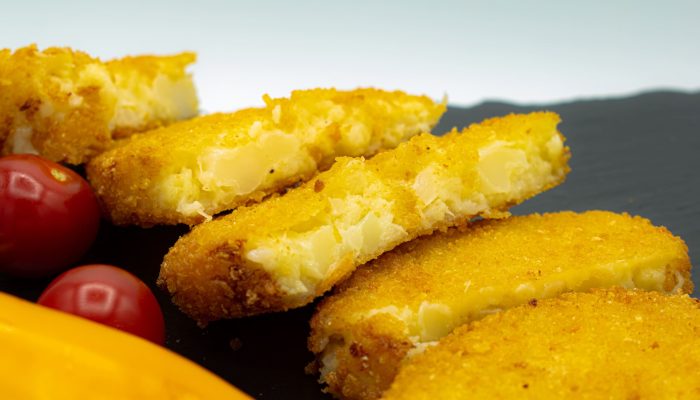 Blumenkohl-Käse-Medaillons vom Imbiss Fritz in Bielefeld: Knusprig paniert, mit zartem Blumenkohl und Käse – ein leckerer Snack für jeden Geschmack.