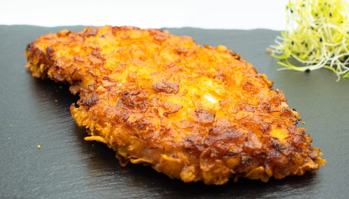 Knusperschnitzel vom Imbiss Fritz in Bielefeld: Knusprig paniertes Schnitzel, außen goldbraun und innen zart – ein echter Genuss für Schnitzelfans.